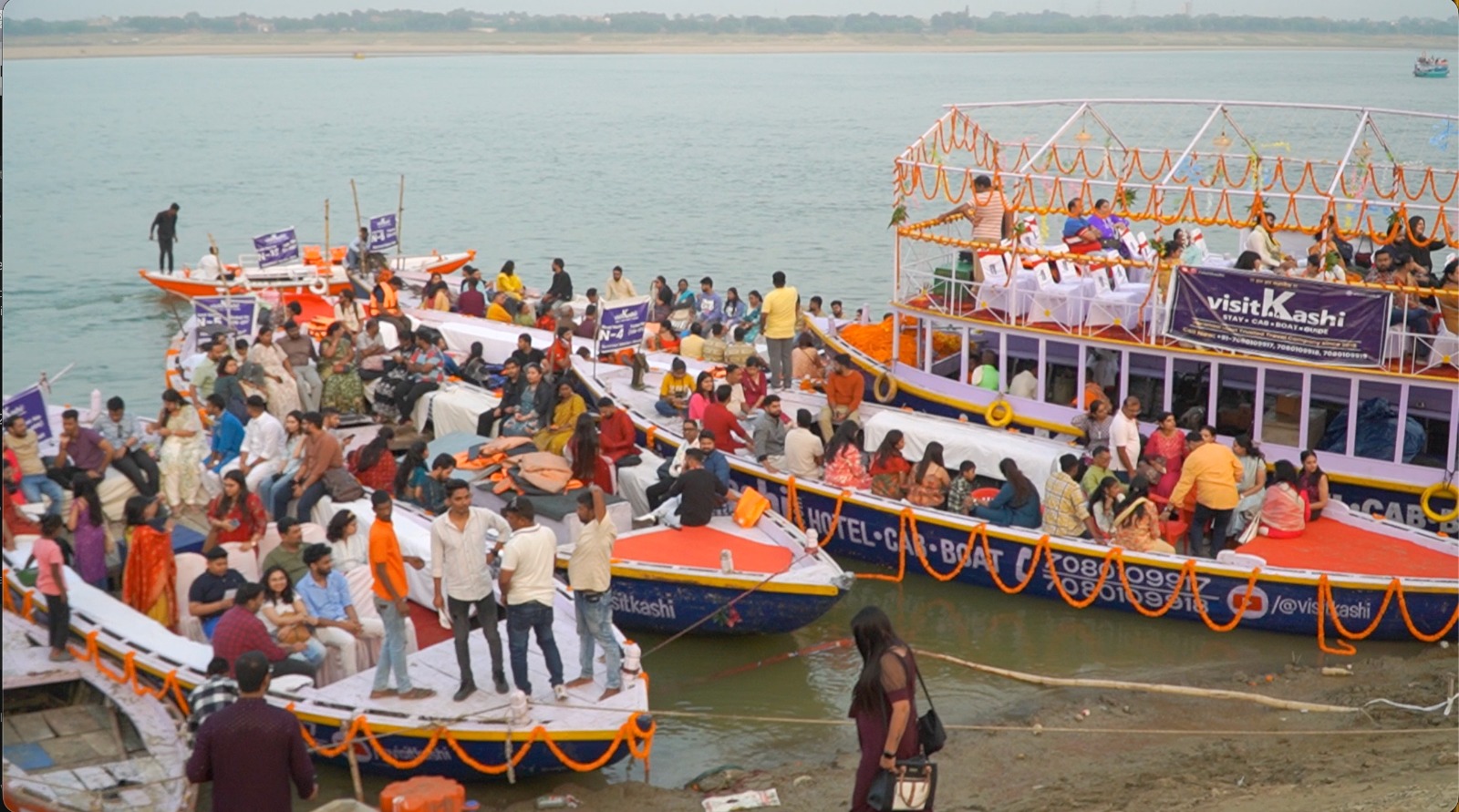Guests boarding Dev Diwali boats at the ghat in Varanasi